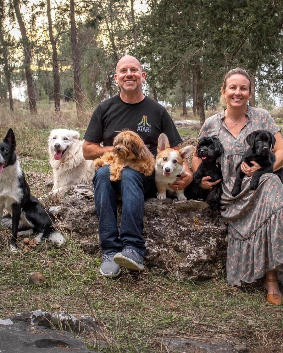 Omri Livny and Keren Livny with their dogs.